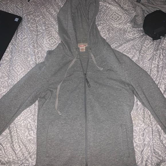 Grey zip up. Guess.